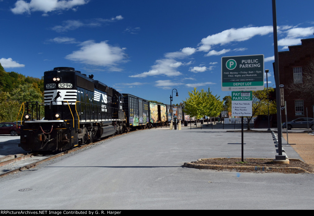 NS yard job E19 and the Depot Grille and city parking lot under a Kodachrome sky.  